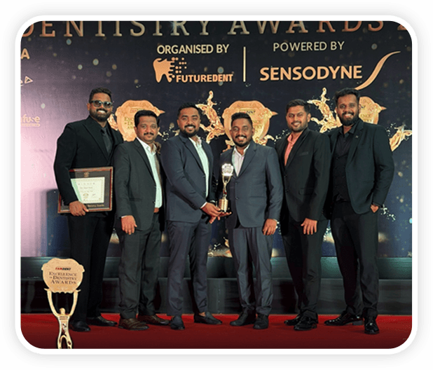 Elite Dental Studio team receiving a dentistry excellence award